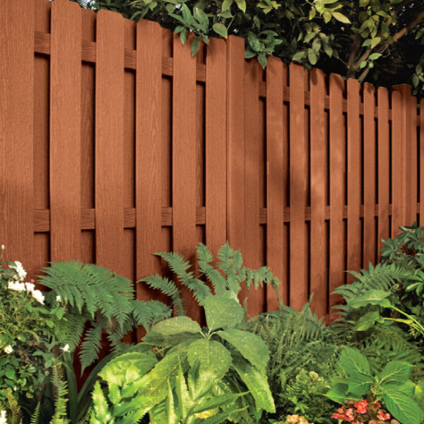 wood fence near foliage