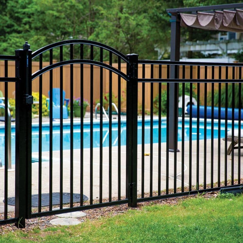 Black iron fencing near Moorpark Country Estates, Moorpark, California, positioned in front of a home swimming pool.