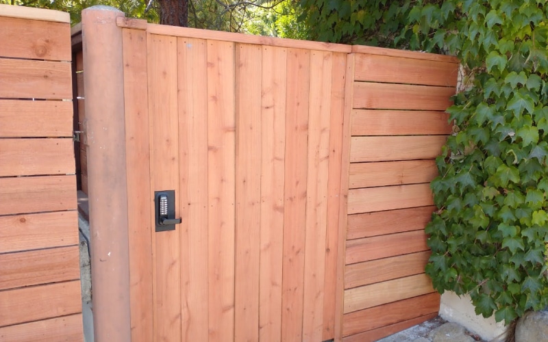 Wood fences and gate with keypad, some of our custom fencing near Somis, California.