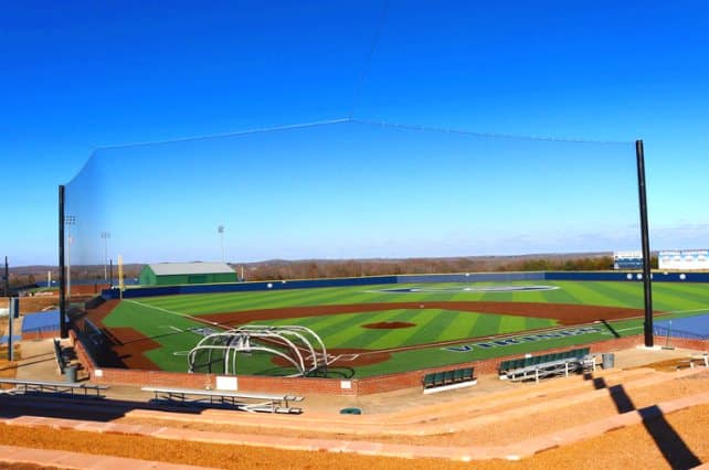 Backstop and barrier netting around a baseball field