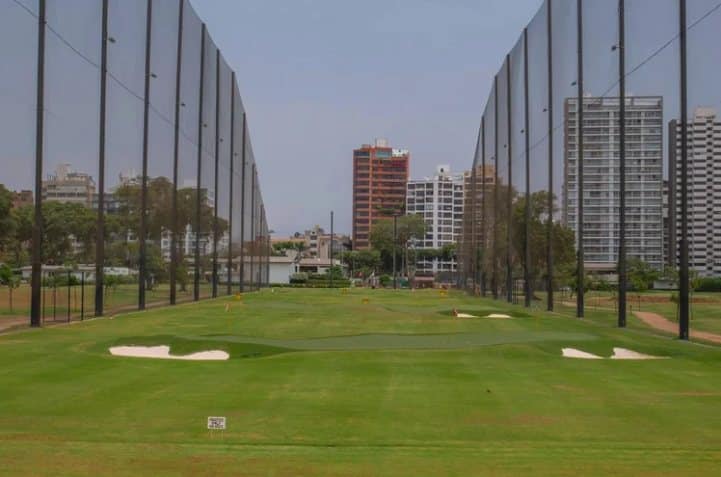 Tall driving range netting on steel poles