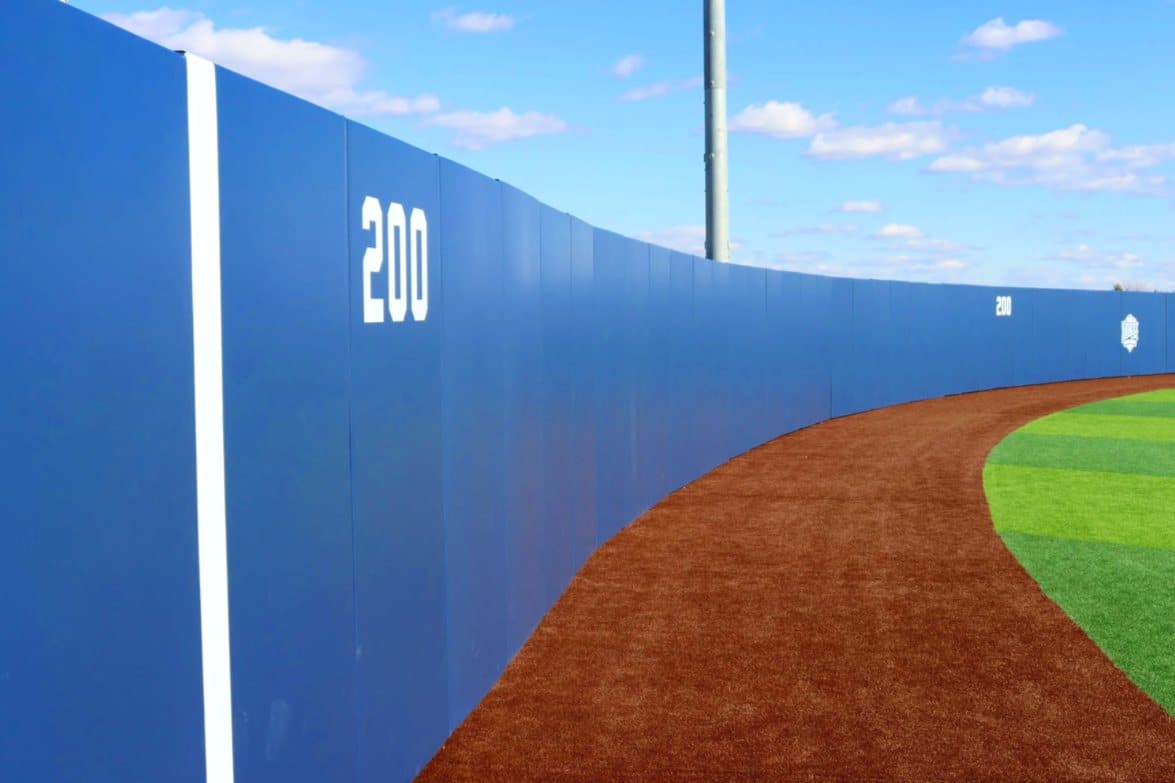 Blue padded outfield wall
