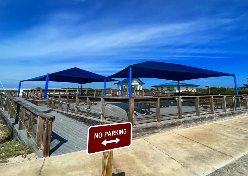 Blue shade sails over a spectator deck